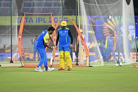 MS Dhoni (L) and Ayush Mhatre during nets on Thursday