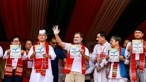 LoP in the Lok Sabha and Congress leader Rahul Gandhi releases the party's manifesto, as others look on, during a public meeting in Assam, April 2, 2026.