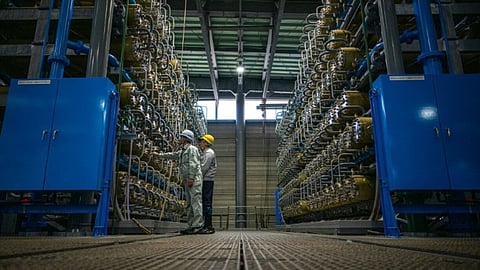 This picture taken on January 14, 2026 shows staff members working at Sea Water Desalination Plant in Fukuoka.
