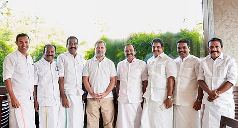 Leader of Opposition in Lok Sabha Rahul Gandhi, fourth left, poses for photographs with Congress MP KC Venugopal, third right, and other party leaders, during a meeting ahead of the Kerala Assembly elections, in Kerala.