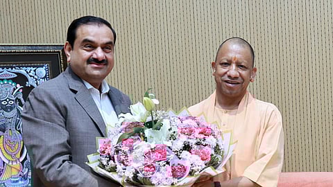 The Adani Group chief praised Adityanath’s roadmap to make Uttar Pradesh a USD 1T economy by 2030, reaching USD 6T by 2047.