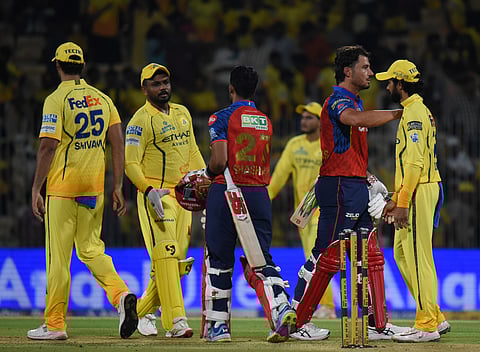 Players of both Chennai Super Kings and Punjab Kings shake hands after the match on Friday