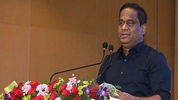 Visakhapatnam Port Authority Chairperson M. Angamuthu speaking at the business meet with stakeholders in Visakhapatnam on Thursday.