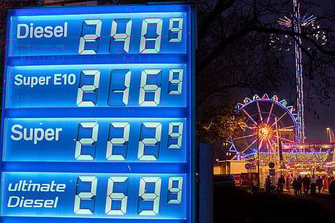 Gas prices are displayed near a ferris wheel in Frankfurt, Germany, Thursday, April 2, 2026. 
