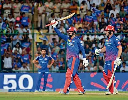 Sameer Rizvi (R) celebrates his fifty against Mumbai on Saturday