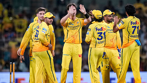 CSKs' Matt Henry celebrates with teammates after taking the wicket of Punjab Kings' Priyansh Arya during an IPL 2026 T20 cricket match between Chennai Super Kings and Punjab Kings on April 3, 2026. 
