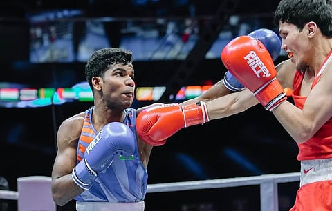 Vishvanath Suresh (L) in action on Saturday