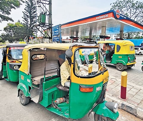 Autori-ckshaws queue up for LPG at a station amid a supply crisis  in Bengaluru on Sunday