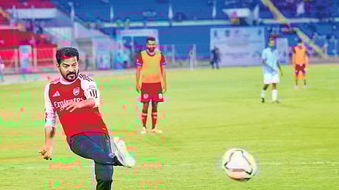 Chief Minister A Revanth Reddy plays football during the closing ceremony of the 74th BN Mullick Memorial All India Police Football Championship at Gachibowli Stadium