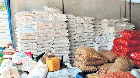 The food items being packed inside the godown at Vadanapally in Thrissur