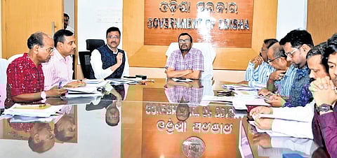 Revenue and Disaster Management minister Suresh Pujari presiding over a meeting to review utility of Ama Sathi chatbot, in Bhubaneswar 