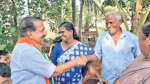 Ramesh Chennithala greeting voters duing a campaign in Haripad.