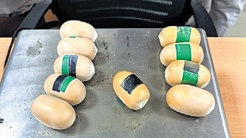 Officials said the smuggled gold was concealed in paste form inside 
capsule-shaped packets