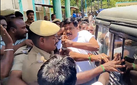 Two persons from Vellore who came to raise objection to AIADMK Jolarpettai candidate KC Veeramani nomination were allegedly attacked by party cadres in Natrampalli on Tuesday.