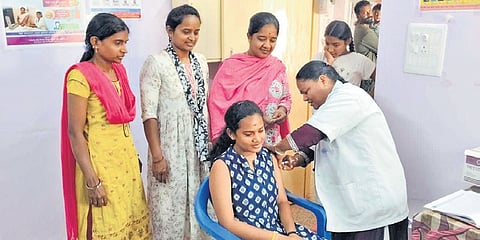 A girl gets her HPV vaccine shot on Tuesday in Bengaluru 