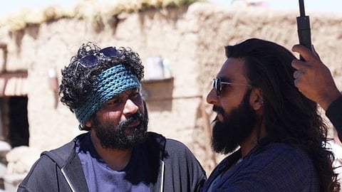 Alongside the note, Dhar shared throwback photos from the set, including a candid shot of Panicker with Ranveer Singh.