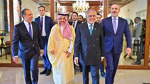 In this photo released by the Pakistan Ministry of Foreign Affairs, from left, Egyptian Foreign Minister Badr Abdelatty, Saudi Arabia's Foreign Minister Prince Faisal bin Farhan Al-Saud, Pakistan's Foreign Minister Ishaq Dar and Turkish Foreign Minister Hakan Fidan walk prior to their meeting to discuss the Middle East war in Islamabad, Pakistan, Sunday, March 29, 2026.