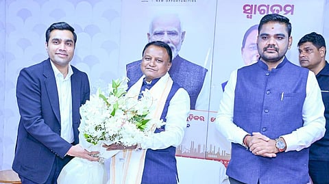Karan Adani greets Odisha CM Mohan Charan Majhi in presence of Industries Minister Sampad Charan Swain on Tuesday at Khurda.