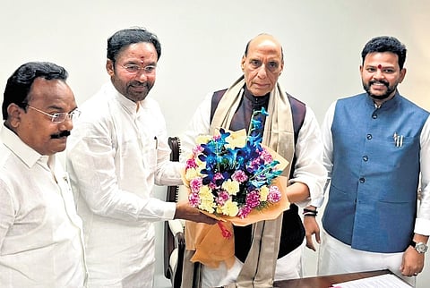 Union Coal & Mines Minister G Kishan Reddy, along with Civil Aviation K Rammohan Naidu and Adilabad MP G Nagesh, greet Defence Minister Rajnath Singh in New Delhi.
