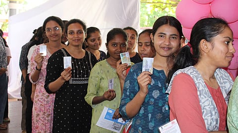 Women standing in queue to cast their vote in Bagalkot on Thursday.