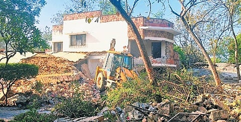 Drive at Tilapth Valley clears unauthorised structures; 23 farmhouses demolished while some areas remain due to High Court stay orders