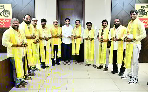 Minister for IT Nara Lokesh during meeting with 'My TDP App' top 10 performers at the central party office in Mangalagiri on Wednesday. 