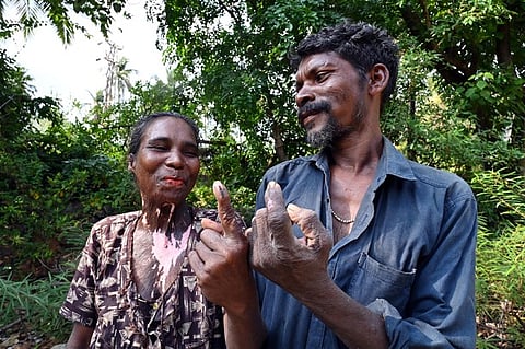 Bindu and Rajan, a tribal couple from Vilangad, after casting their vote at the Paloor polling booth in Kozhikode
