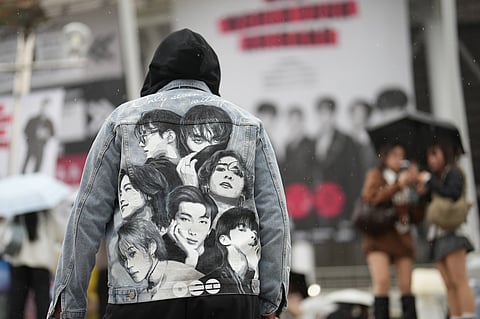 A fan of K-pop band BTS arrives for the BTS World Tour Arirang outside its venue in Goyang.