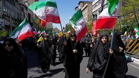 Government supporters gather to mark the 40th day since the death of Supreme Leader Ayatollah Ali Khamenei in Tehran, Iran, Thursday, April 9, 2026. 