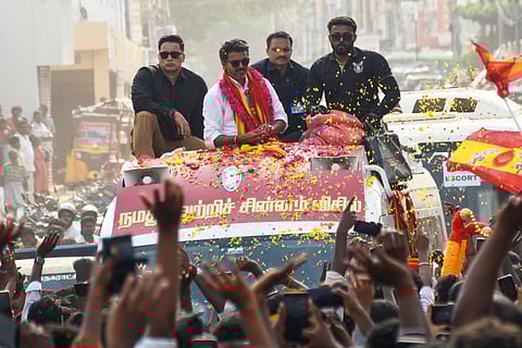 TVK chief Vijay conducts a roadshow at Palayamkottai in Tirunelveli ahead of the upcoming Tamil Nadu Assembly elections on Wednesday