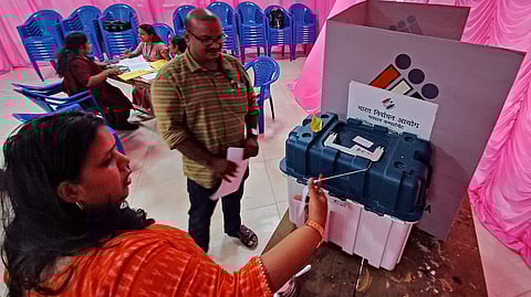 Officials prepare a pink polling booth for women voters at Government GHSS Manacadu in Thiruvananthapuram on the eve of the Assembly elections.