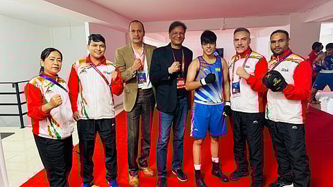 Priya (60 kg) celebrates her gold medal win with BFI president Ajay Singh and the coaches at Asian Boxing Championship