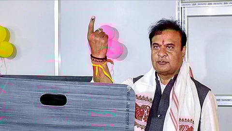 Assam Chief Minister Himanta Biswa Sarma shows an inked finger after casting vote in the Assam Legislative Assembly election, at a polling station, in Guwahati, Thursday, April 9, 2026.