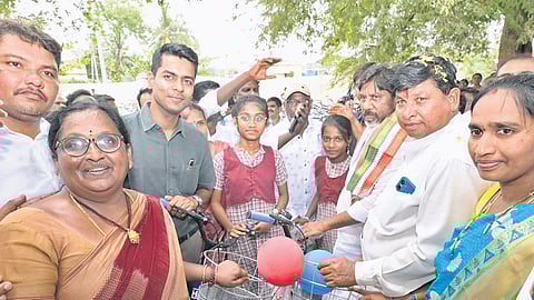 Deputy Chief Minister Mallu Bhatti Vikramarka distributes bicycles to students under the Amma Foundation initiative at Bonakal in Khammam district on Thursday.