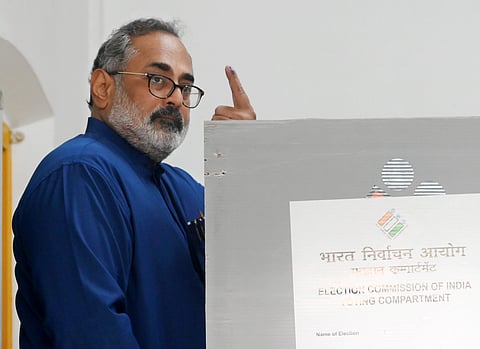 Kerala BJP President Rajeev Chandrasekhar shows his ink-marked finger after casting vote during the state Assembly elections, in Thiruvananthapuram, Thursday, April 9, 2026.