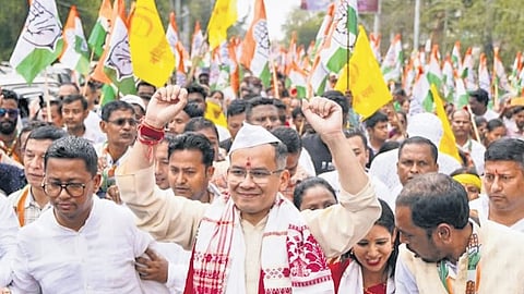 Assam Congress chief and the party’s candidate from Jorhat, Gaurav Gogoi, greets supporters during his nomination rally.