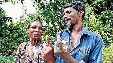 Bindu and Rajan, a tribal couple from Vilangad, after casting their vote at the Paloor polling booth on Thursday.