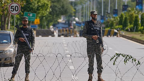 Police and Paramilitary soldiers patrol to ensure security ahead of the United States and Iran's possible negotiations in Pakistan's capital, Islamabad, on Friday, April 10, 2026.