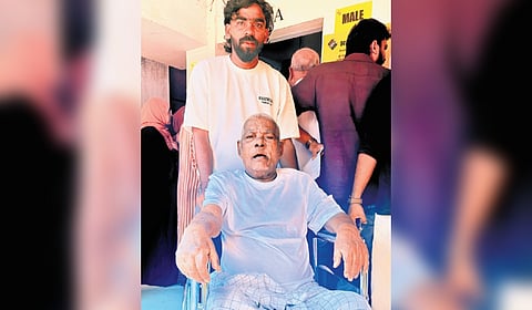Eighty-two-year-old Muhammed K T at a polling booth in Vengara to cast his vote.