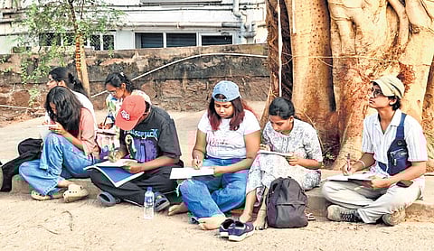 Urban Sketchers Visakhapatnam artists capture city life through live on-location sketches across iconic spots in the city. 