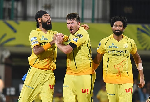 Jamie Overton (C) celebrates a wicket on Saturday