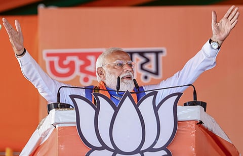 In this image posted on April 11, 2026, Prime Minister Narendra Modi addresses a public rally ahead of the West Bengal Assembly elections, in Purba Bardhaman, West Bengal.