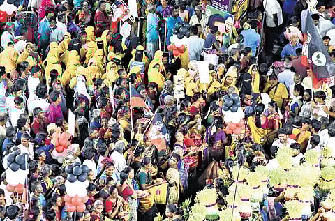 Women and children at a political party campaign in Tiruchy.