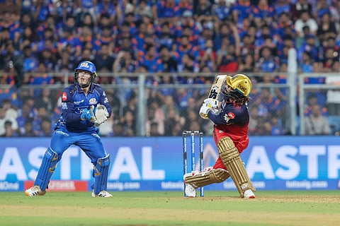 RCB captain Rajat Patidar plays a reverse scoop against MI on Sunday