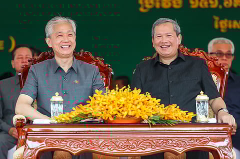 Cambodia’s Prime Minister Hun Manet (R) and Chinese Ambassador to Cambodia Wang Wenbin (L) at the ceremony for the construction of the Funan Techo canal project section 2 in Takeo province.