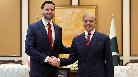 U.S. Vice President JD Vance, left, shakes hands with Pakistan's Prime Minister Shehbaz Sharif, Saturday, April 11, 2026, while meeting in Islamabad for talks about Iran.