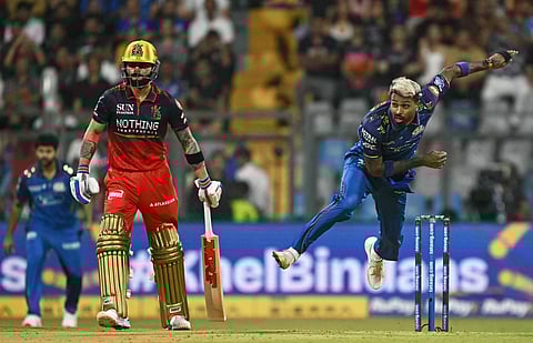 Action from the match between RCB and MI