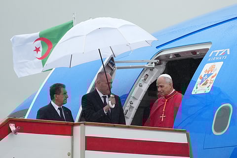 Pope Leo XIV arrives at Algiers' Houari Boumédiène International Airport on Monday, April 13, 2026, at the start of an 11-day apostolic journey to Africa. 