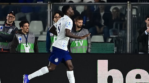 Inter Milan's French forward #09 Marcus Thuram celebrates after scoring his team second goal during the Italian Serie A football match between Como and Inter Milan at the Giuseppe Sinigaglia Stadium in Como, Italy on April 12, 2026