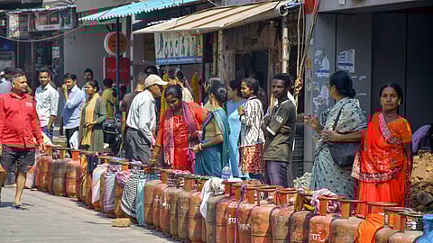 People stand in a queue to refill their gas cylinders amid a nationwide shortage of LPG in Ranchi, April 03, 2026.